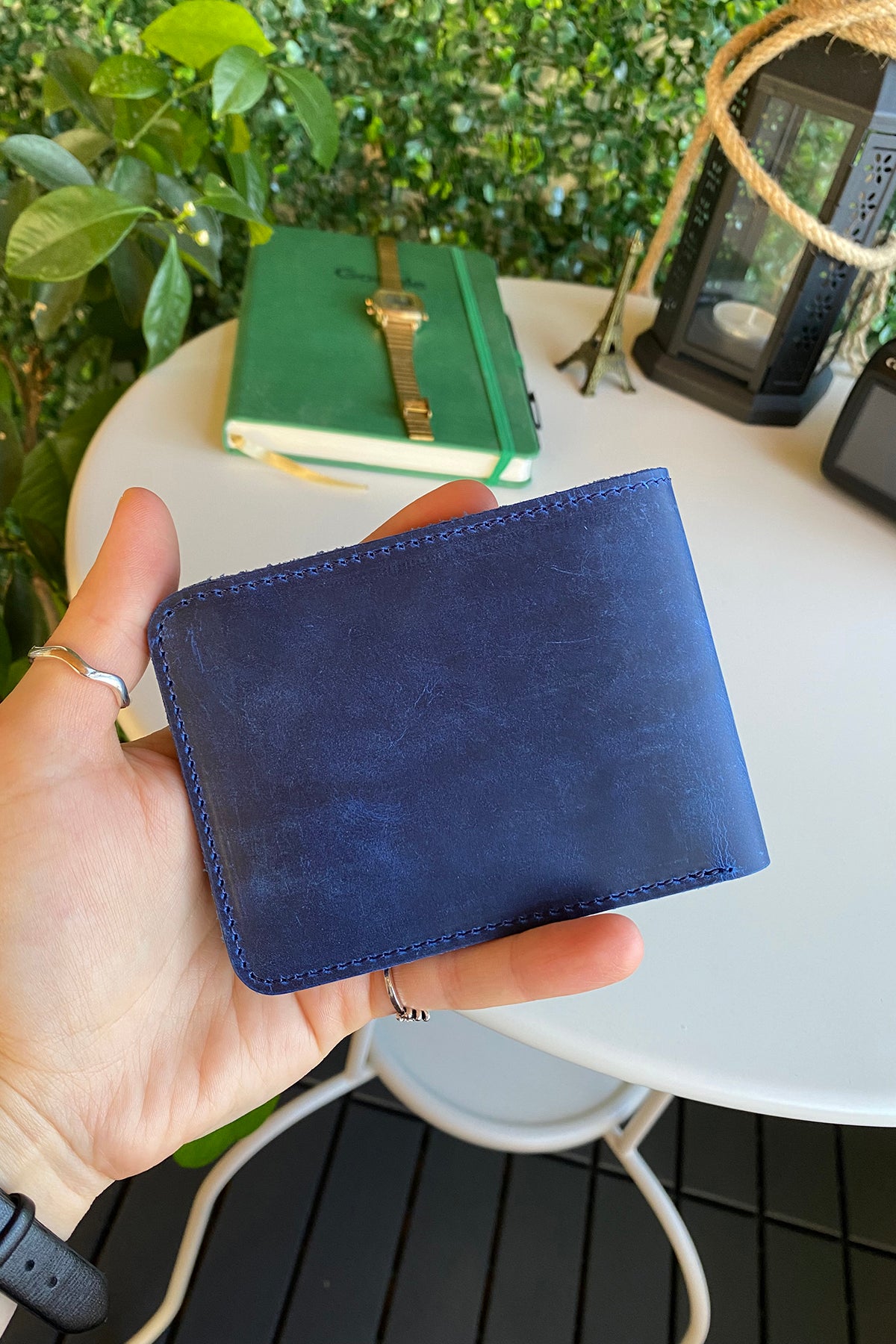 Tulipa Genuine Leather Natural Wallet in four colors: Brown, Red, Blue, and Green, showcasing its sleek design and card slots.
