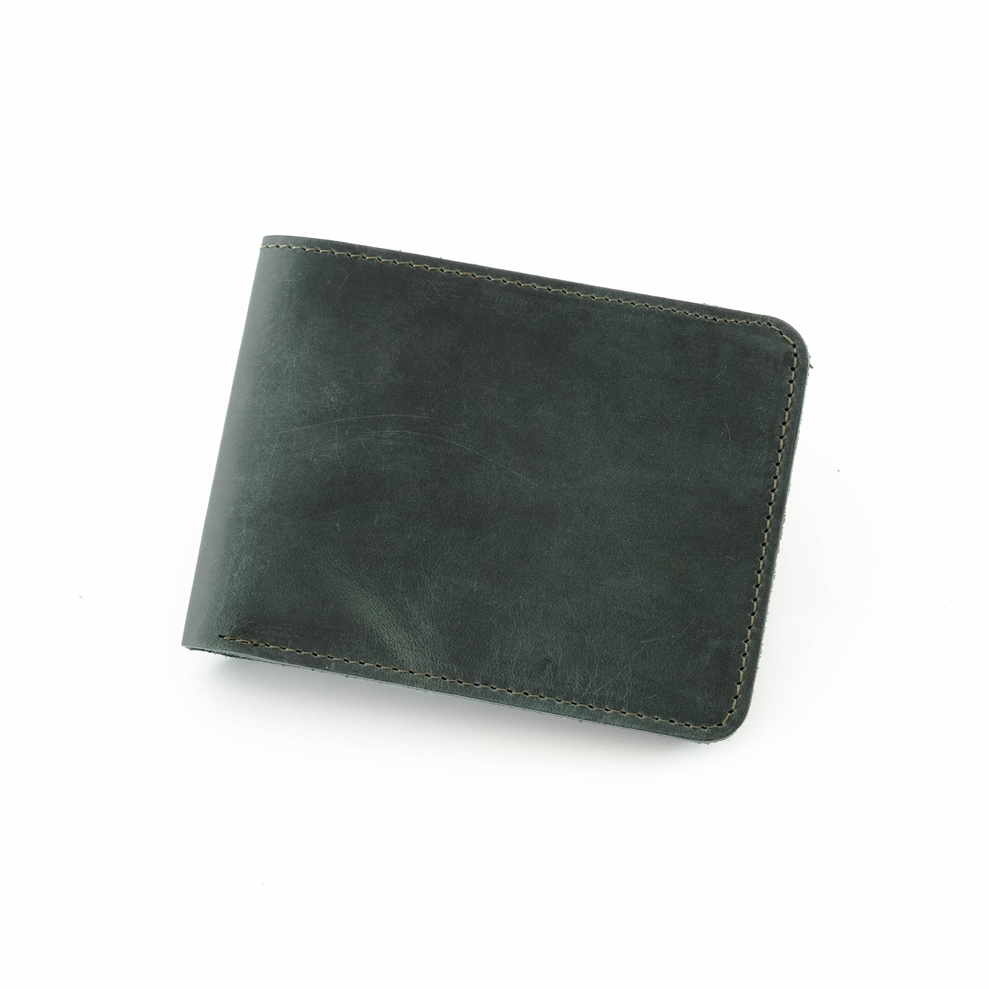 Tulipa Genuine Leather Natural Wallet in four colors: Brown, Red, Blue, and Green, showcasing its sleek design and card slots.