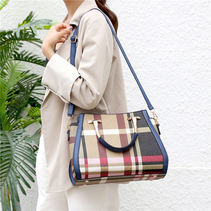 Two-piece single shoulder messenger bag for women, featuring a stylish design in durable PU fabric with a zipper closure.