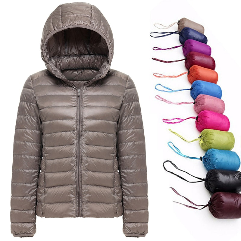Ultra Light Women's Nylon Jacket in various colors, featuring a slim fit design, full sleeves, and zipper closure.