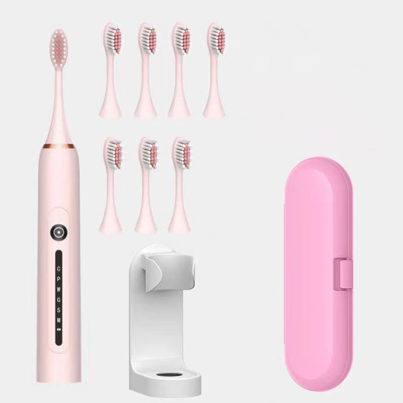 Ultrasonic Sonic Electric Toothbrush with USB charger and multiple brush heads, showcasing its sleek design and advanced features.