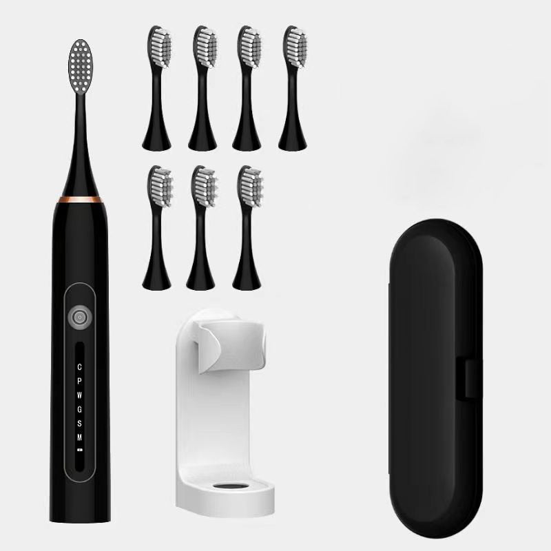 Ultrasonic Sonic Electric Toothbrush with USB charger and multiple brush heads, showcasing its sleek design and advanced features.