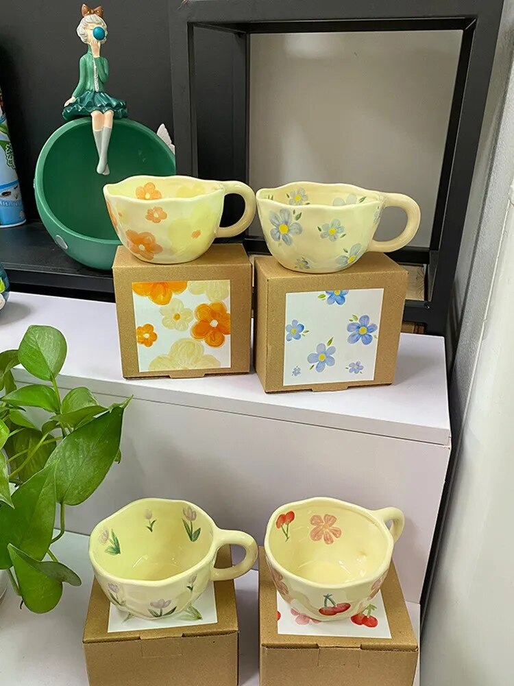 A beautifully designed Unique Floral Coffee Mug featuring vibrant floral patterns in pink, blue, orange, and purple colors, made from high-quality ceramic.