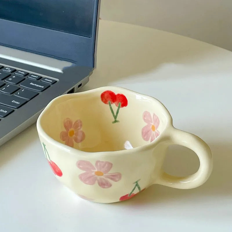 A beautifully designed Unique Floral Coffee Mug featuring vibrant floral patterns in pink, blue, orange, and purple colors, made from high-quality ceramic.