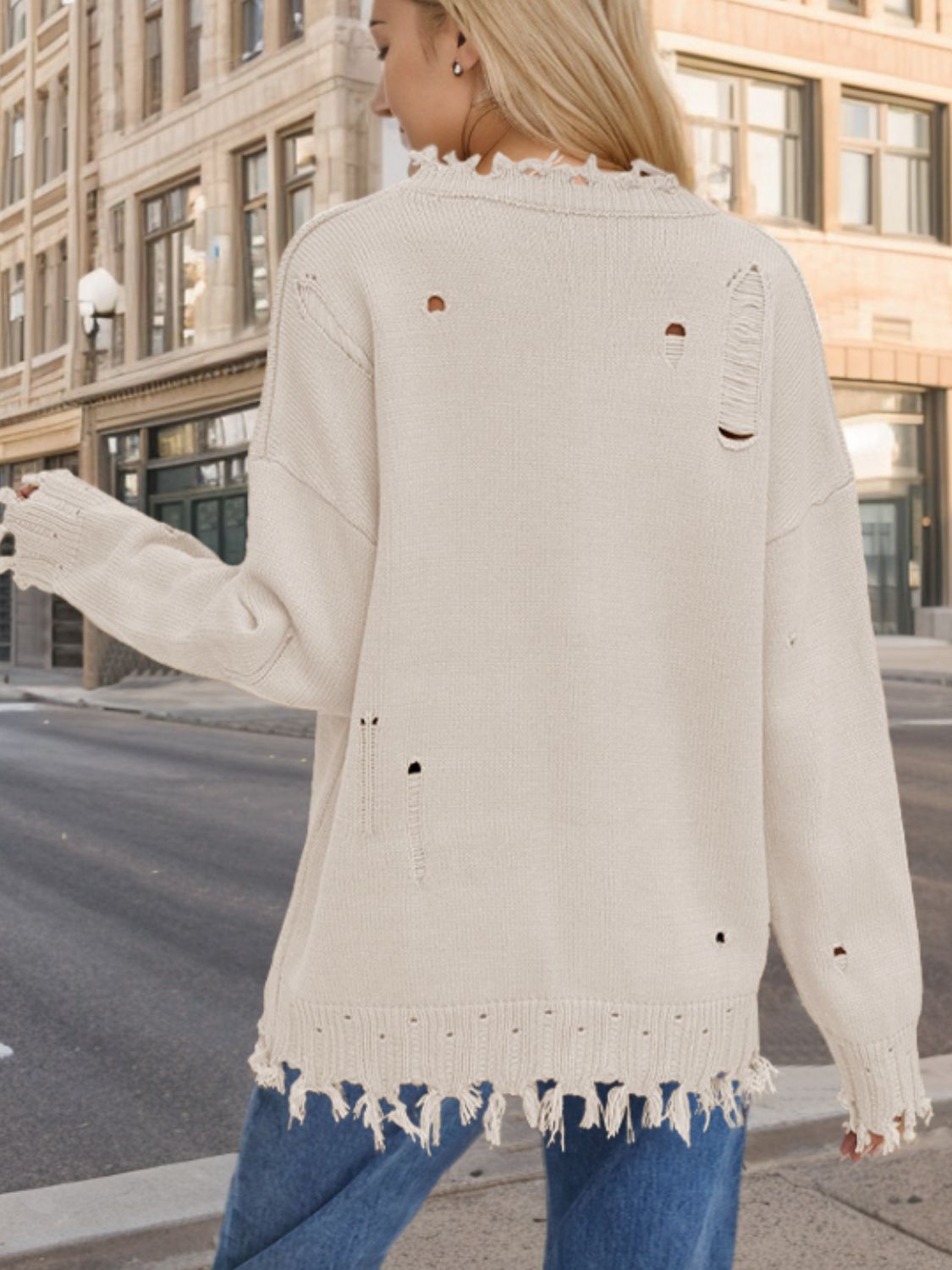 US Flag Distressed Round Neck Long Sleeve Sweater featuring a trendy distressed design, round neck, and comfortable fit.