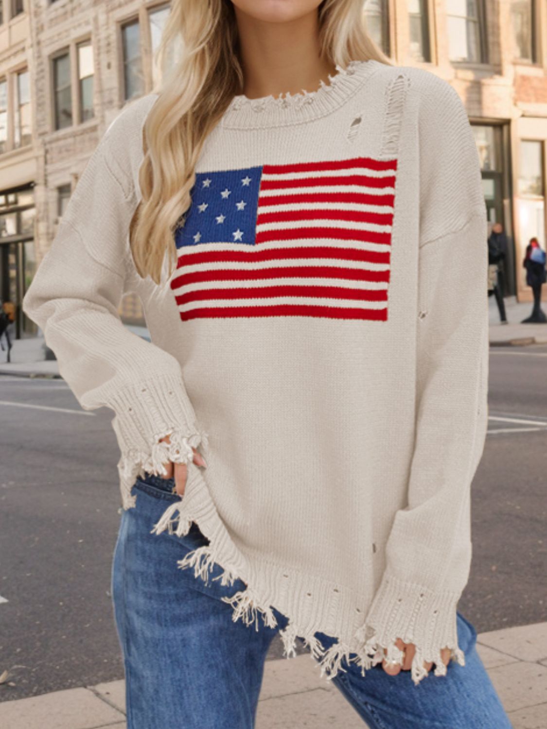 US Flag Distressed Round Neck Long Sleeve Sweater featuring a trendy distressed design, round neck, and comfortable fit.