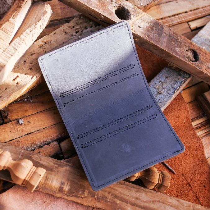 Vintage Bi-Fold Card/Cash Holder in Teal Grey, showcasing its genuine leather texture and vintage design.