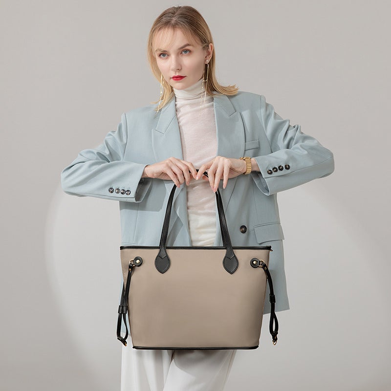 Vintage large capacity shoulder bag in grid-brown, showcasing its stylish design and spacious interior.