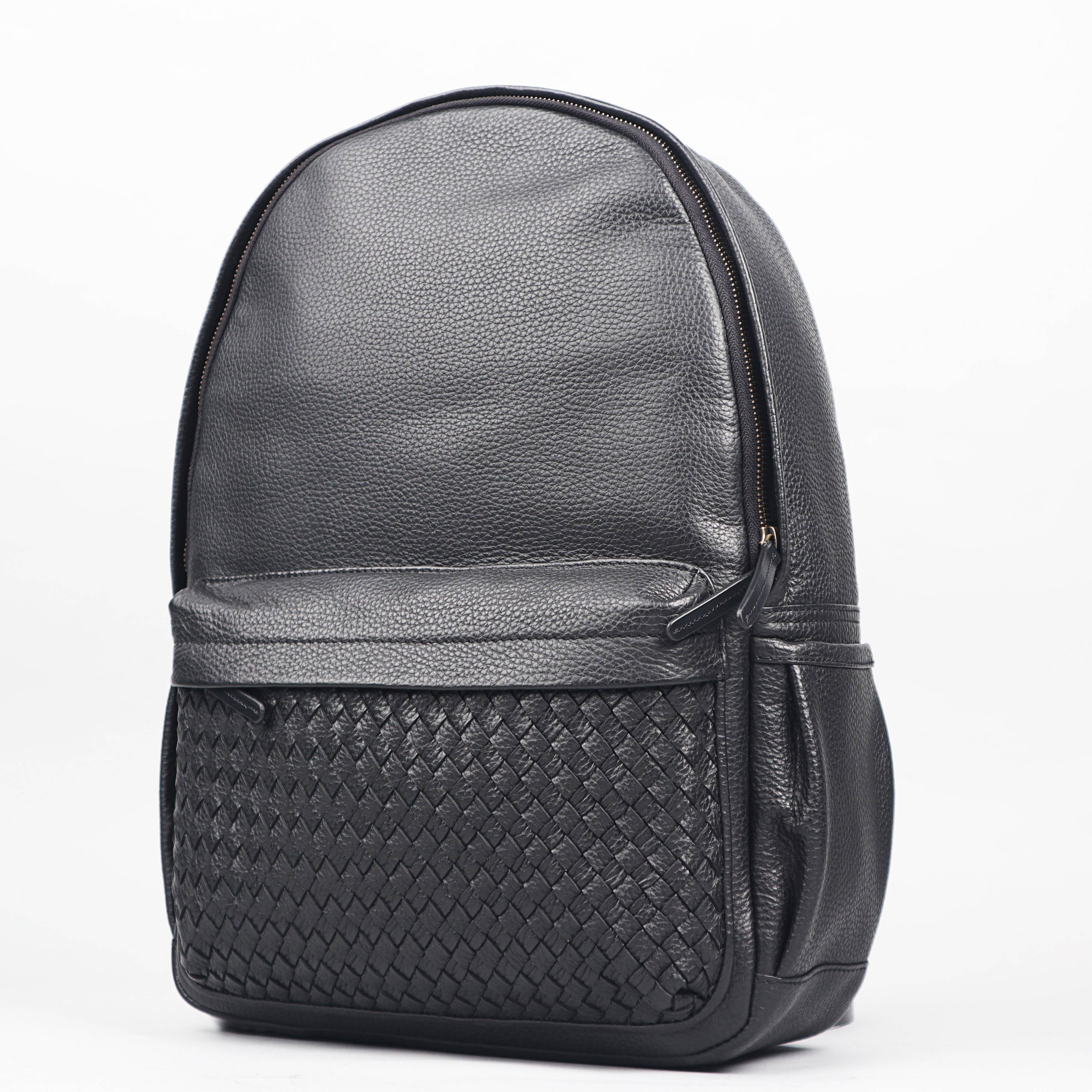 Weaved Journey Leather Backpack showcasing premium full grain leather, padded laptop compartment, and adjustable shoulder straps.
