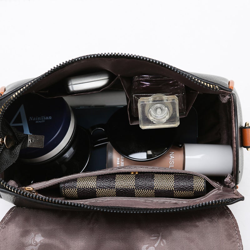 Western Style Fashion Contrast Color Stitching Bucket Bag in wine red, khaki, black, and brown with metal accents and detachable handle.