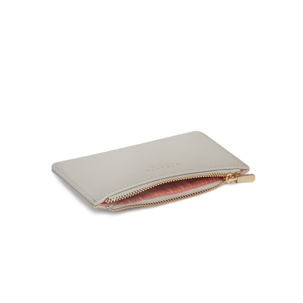 Willow Grey Coin and Card Holder made from 100% vegan leather, featuring a zipped compartment and four card slots, elegantly designed in a stylish grey color.