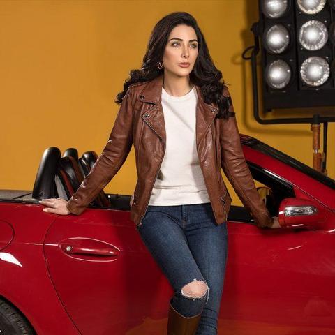 WOMEN PREMIUM MUKMAL Official Leather Jacket showcasing high-quality leather, satin lining, and stylish motorcycle design.