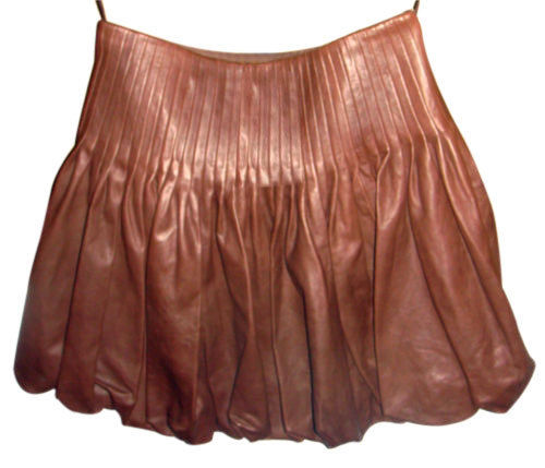 Women Real Lambskin Leather Mini Skirt in black with satin lining and functional pockets, showcasing high-quality craftsmanship.