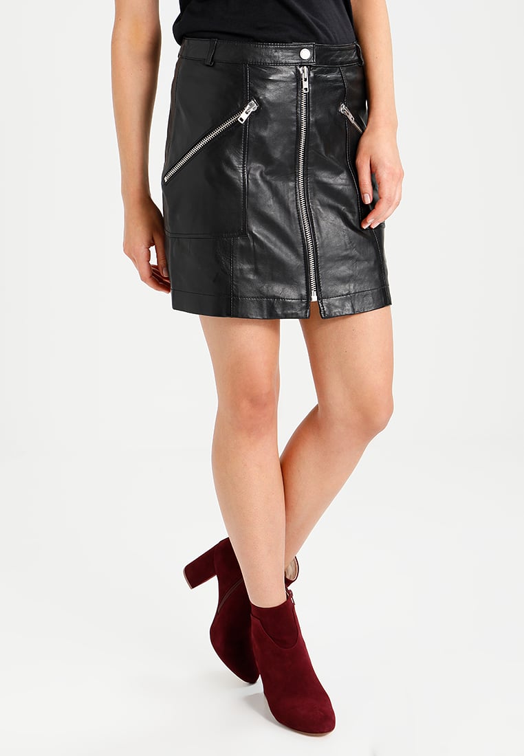 Women Real Lambskin Leather Mini Skirt WS135 featuring high-quality leather, satin lining, and stylish knee-length design with pockets.