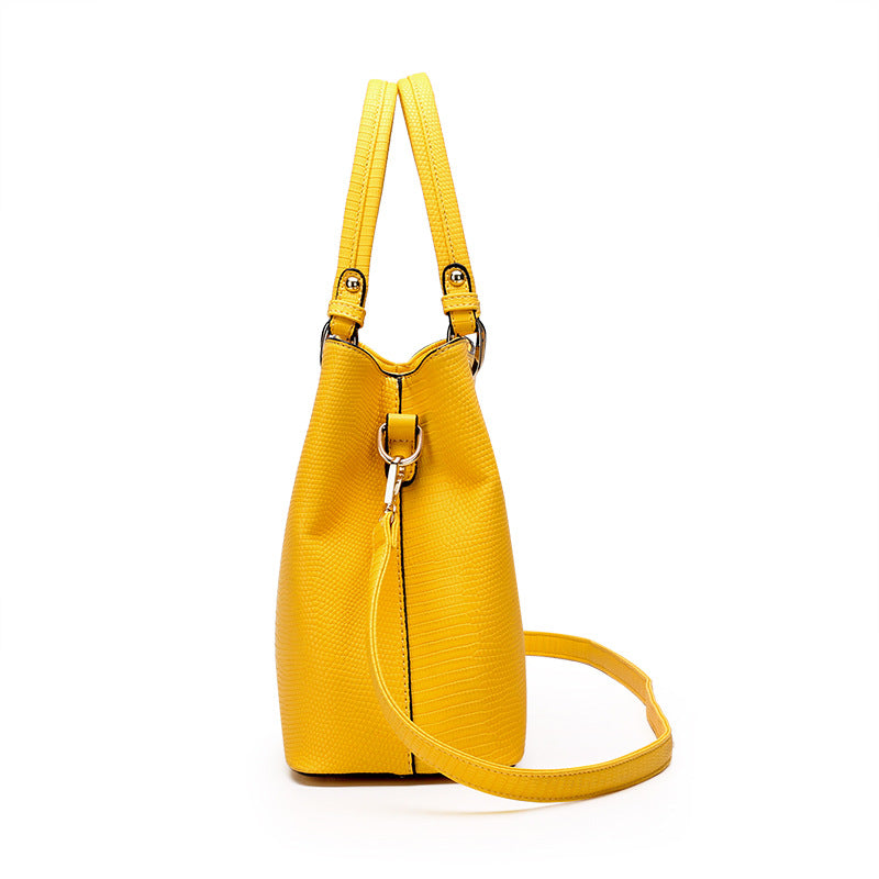 A stylish Women's Fashion Portable Three-Piece Bag Suit in yellow, black, and brown, showcasing its trendy design and practical features.