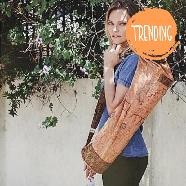 OMsutra Hand Crafted Yoga Bag made of durable hand-embroidered cotton, featuring adjustable shoulder strap and zippered pockets.