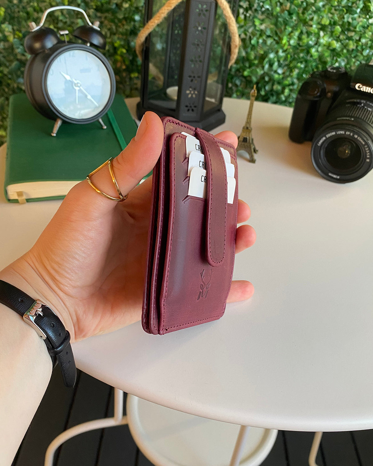 Zona Genuine Leather Card Holder showcasing its sleek design, ID window, and multiple card slots.