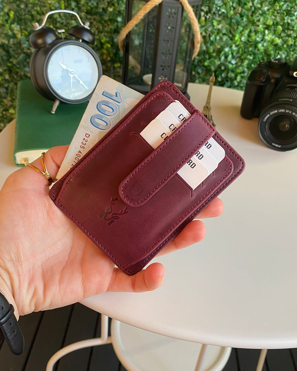 Zona Genuine Leather Card Holder showcasing its sleek design, ID window, and multiple card slots.