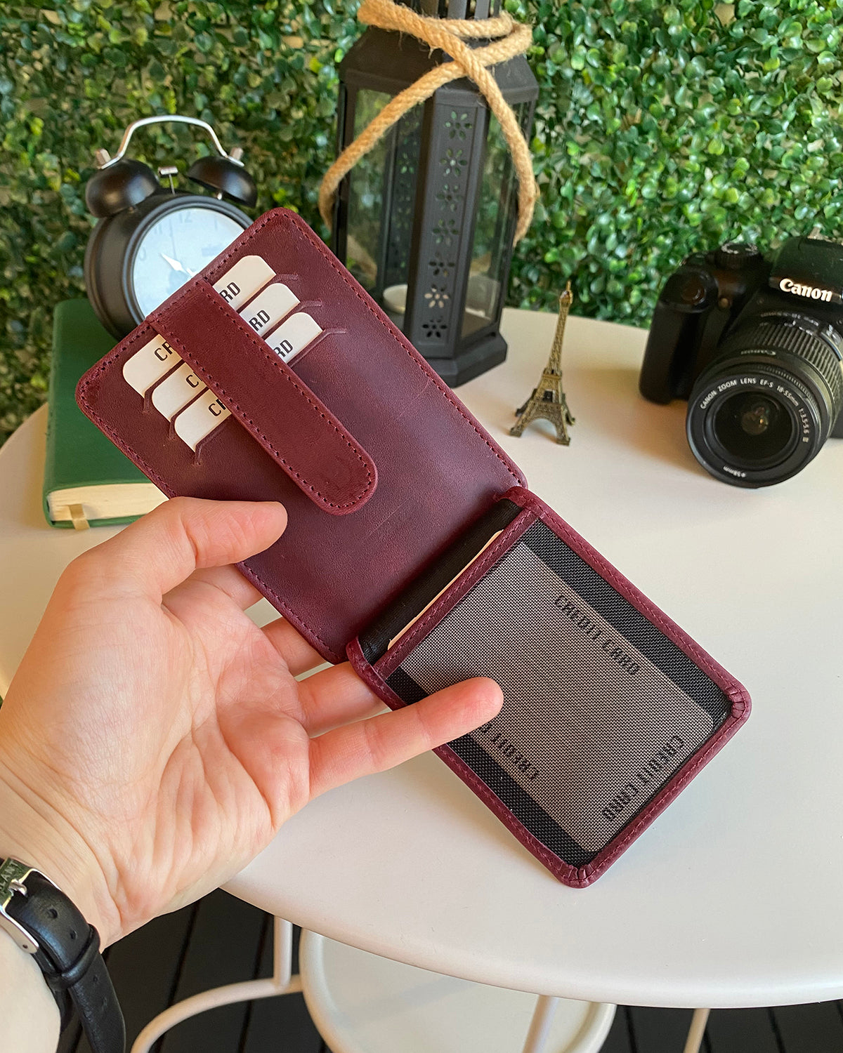 Zona Genuine Leather Card Holder showcasing its sleek design, ID window, and multiple card slots.