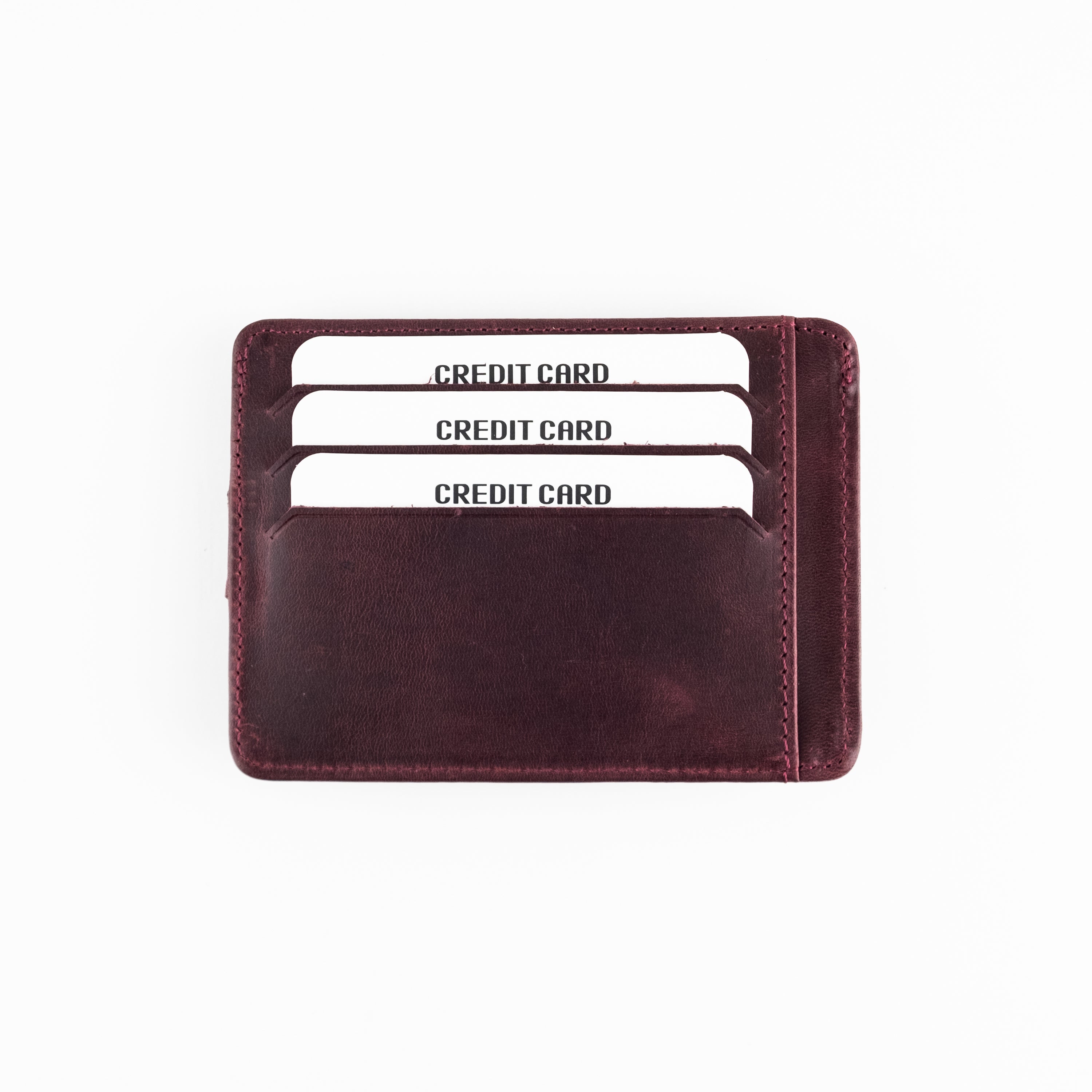 Zona Genuine Leather Card Holder showcasing its sleek design, ID window, and multiple card slots.