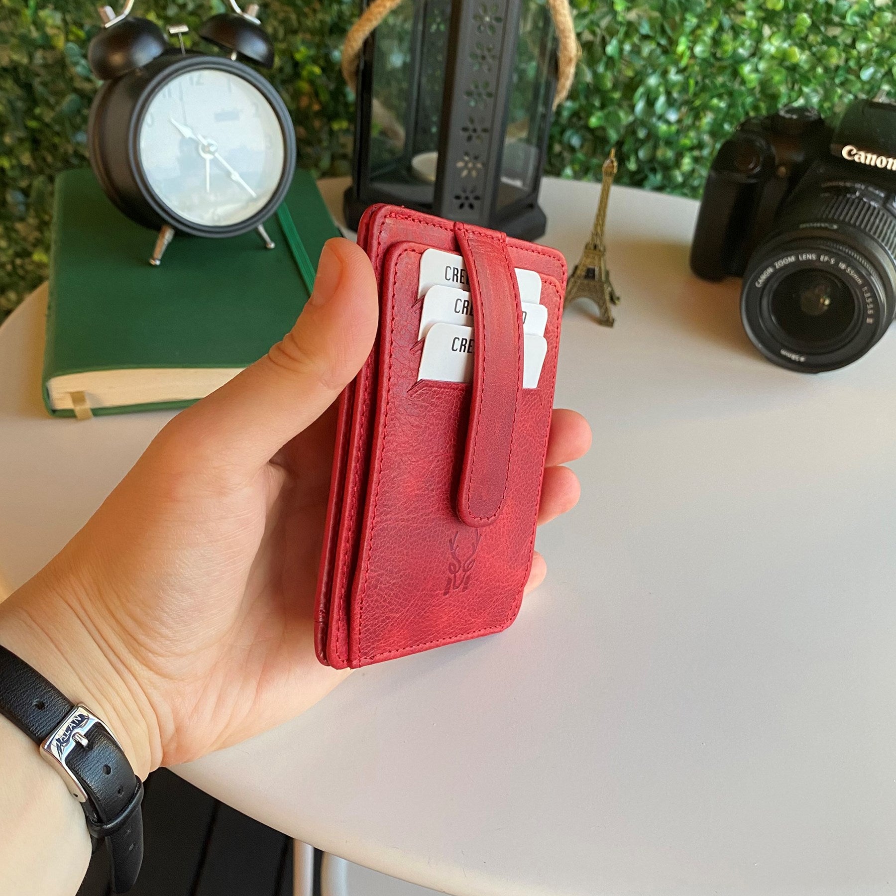 Zona Genuine Leather Card Holder showcasing its sleek design, ID window, and multiple card slots.