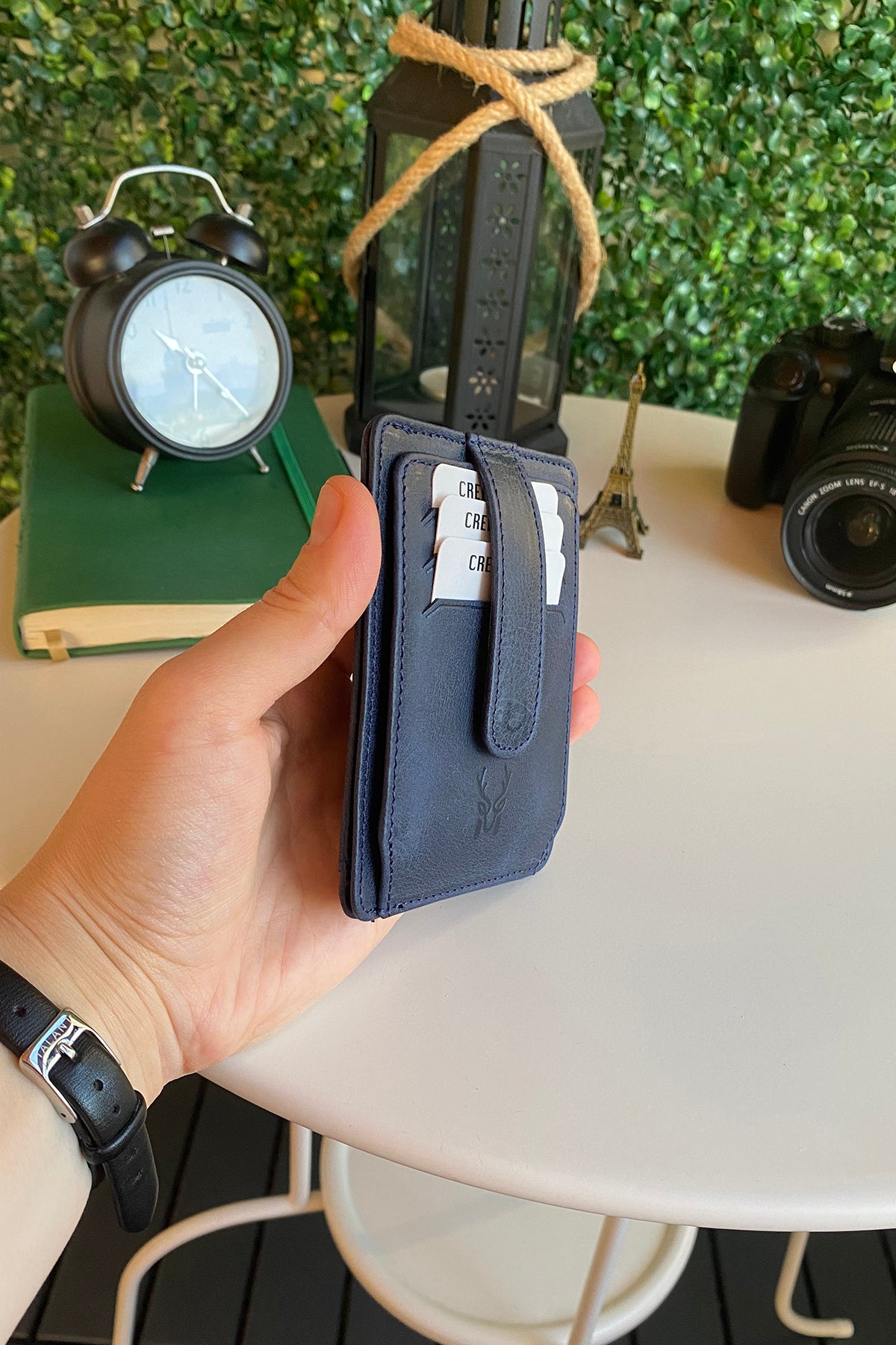 Zona Genuine Leather Card Holder showcasing its sleek design, ID window, and multiple card slots.