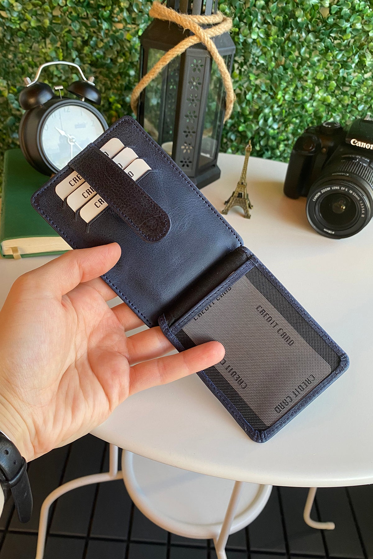 Zona Genuine Leather Card Holder showcasing its sleek design, ID window, and multiple card slots.