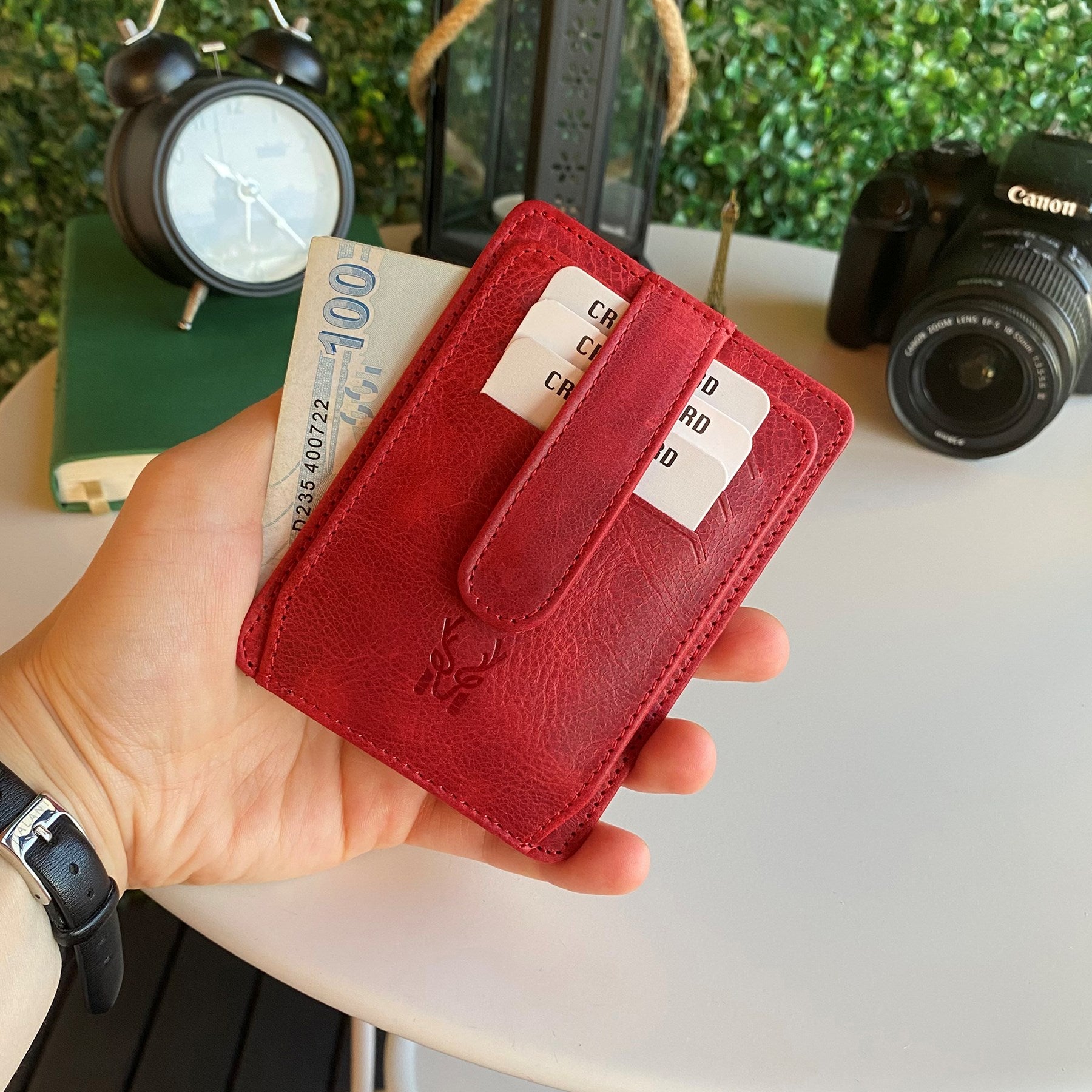 Zona Genuine Leather Card Holder showcasing its sleek design, ID window, and multiple card slots.