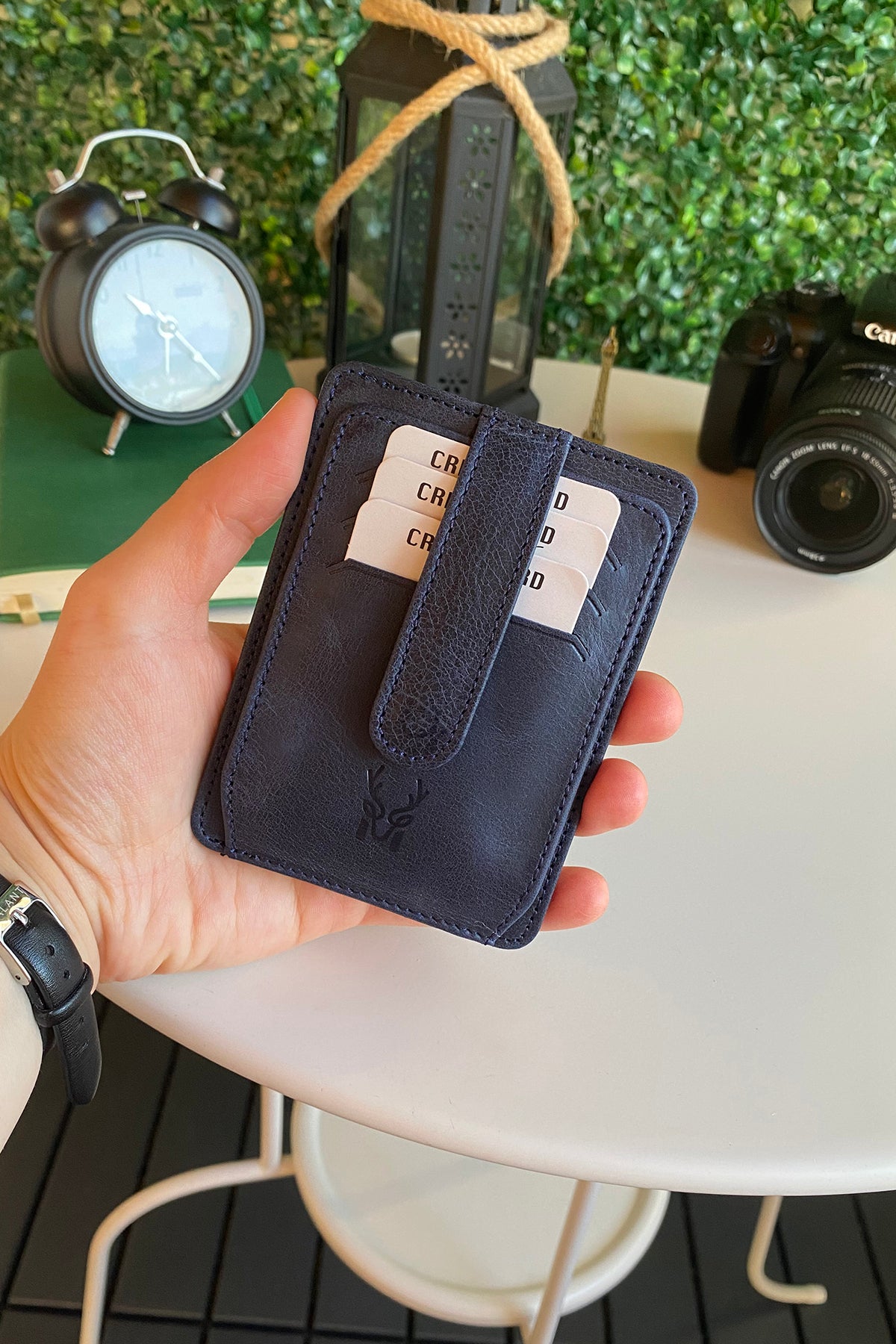 Zona Genuine Leather Card Holder showcasing its sleek design, ID window, and multiple card slots.