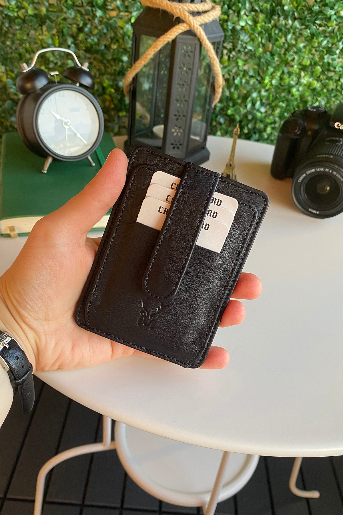 Zona Genuine Leather Card Holder showcasing its sleek design, ID window, and multiple card slots.