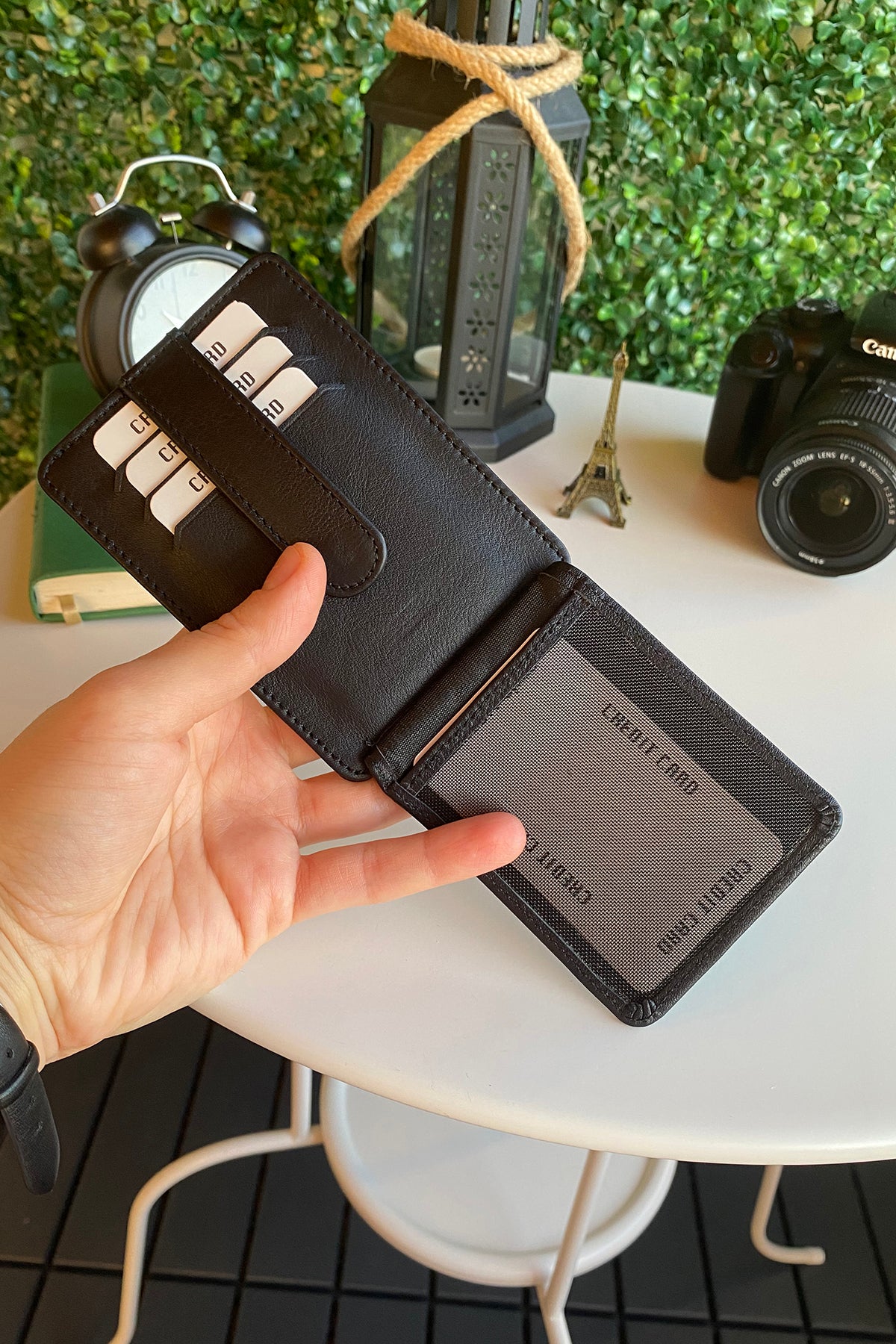Zona Genuine Leather Card Holder showcasing its sleek design, ID window, and multiple card slots.