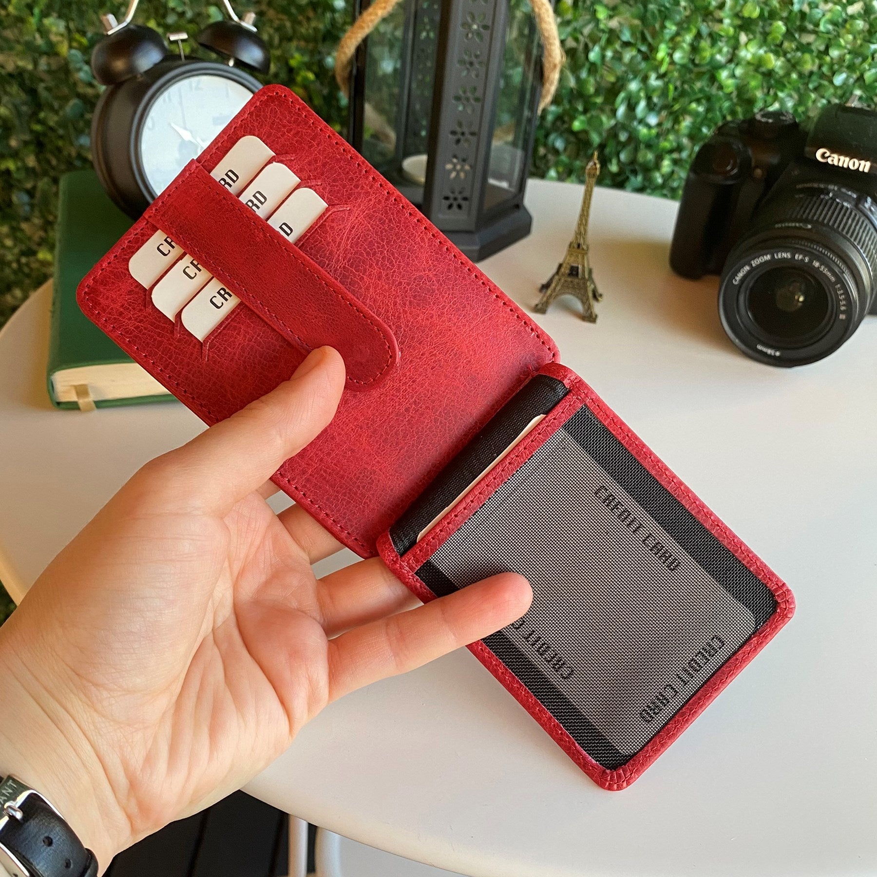 Zona Genuine Leather Card Holder showcasing its sleek design, ID window, and multiple card slots.