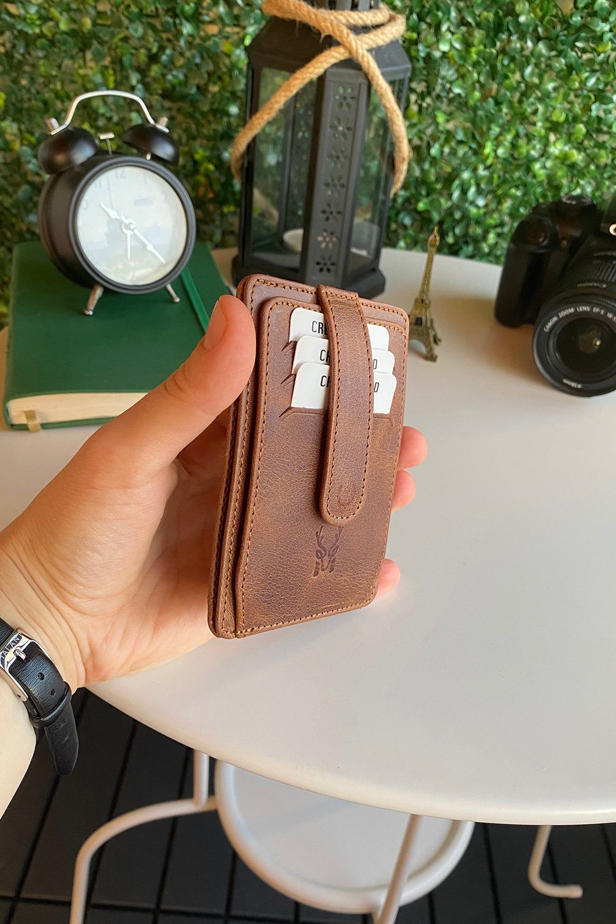 Zona Genuine Leather Card Holder showcasing its sleek design, ID window, and multiple card slots.