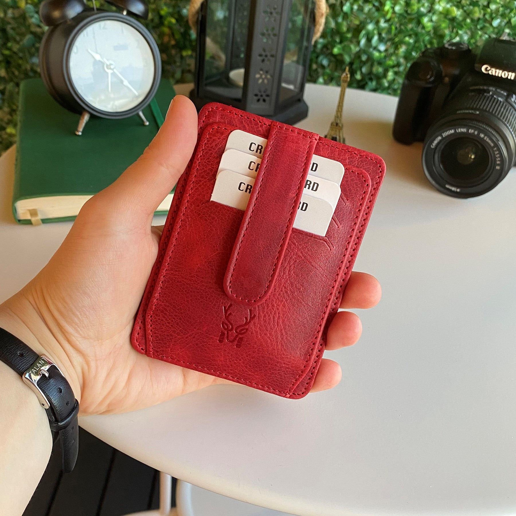 Zona Genuine Leather Card Holder showcasing its sleek design, ID window, and multiple card slots.