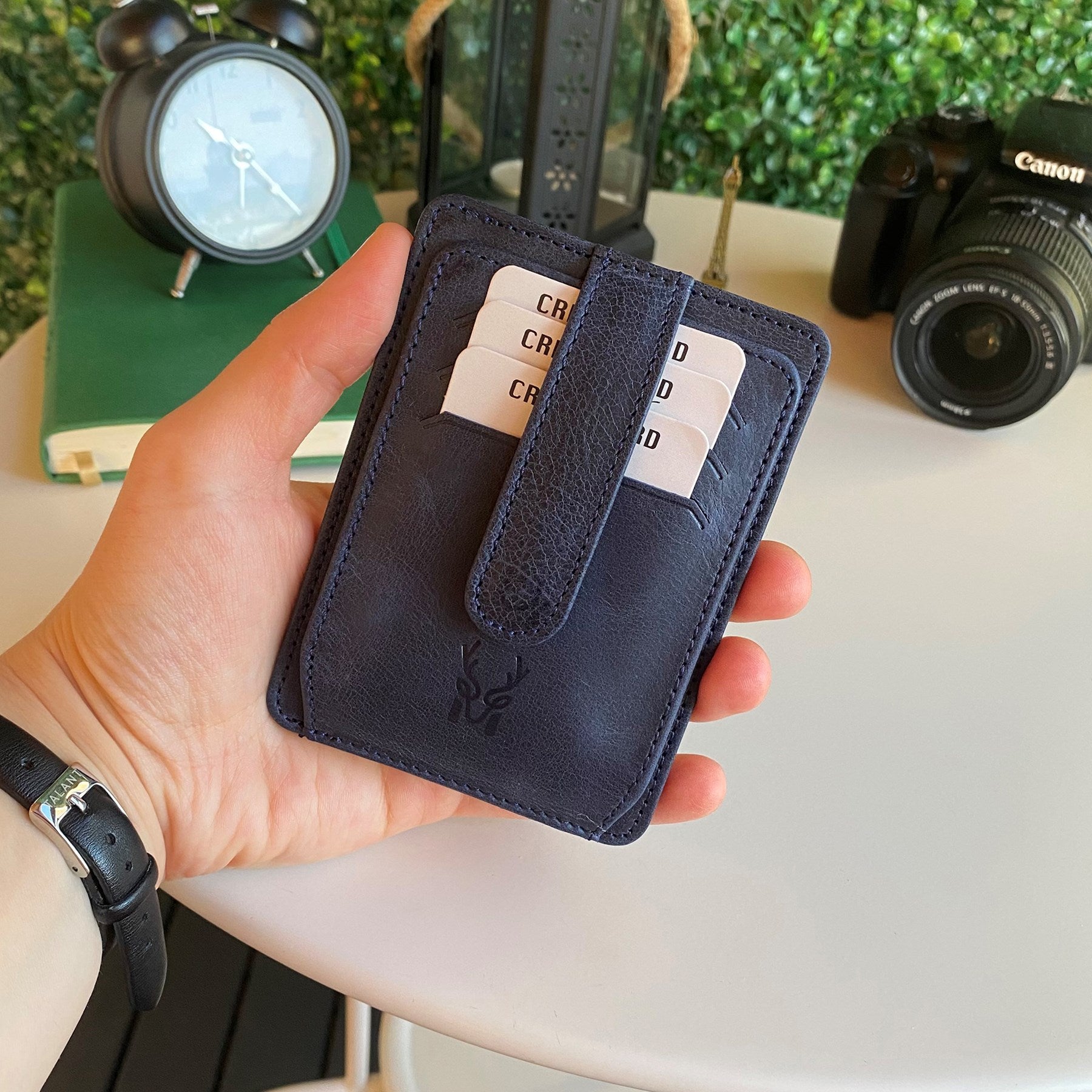 Zona Genuine Leather Card Holder showcasing its sleek design, ID window, and multiple card slots.