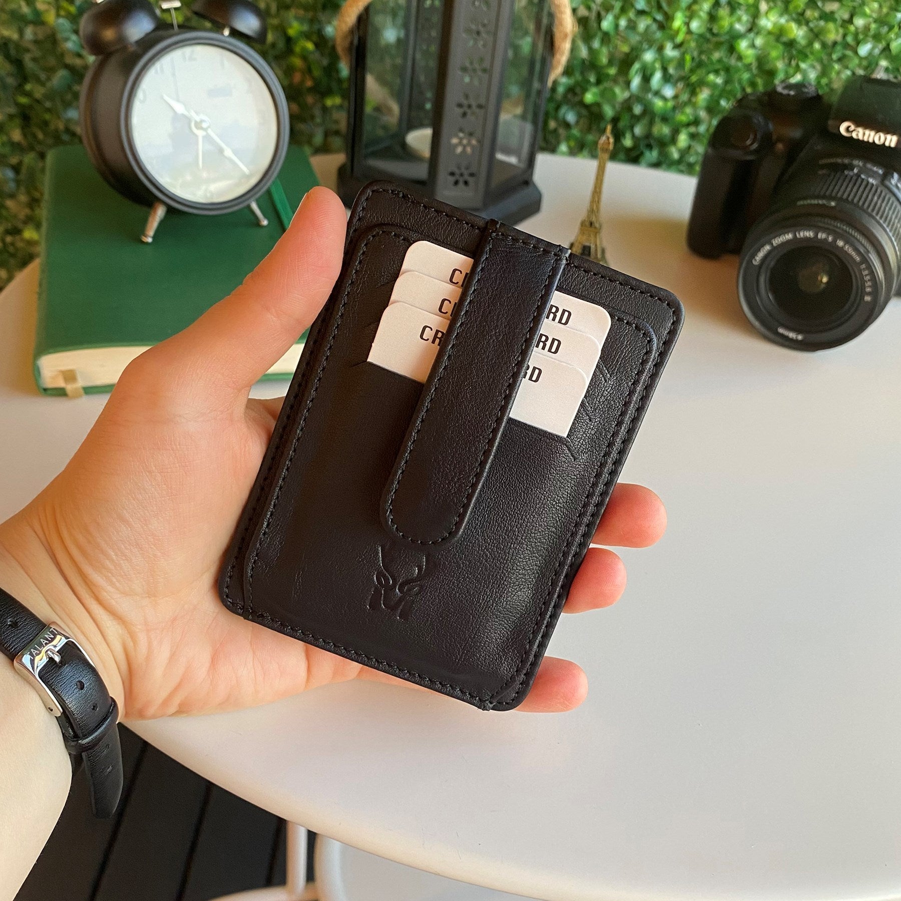 Zona Genuine Leather Card Holder showcasing its sleek design, ID window, and multiple card slots.