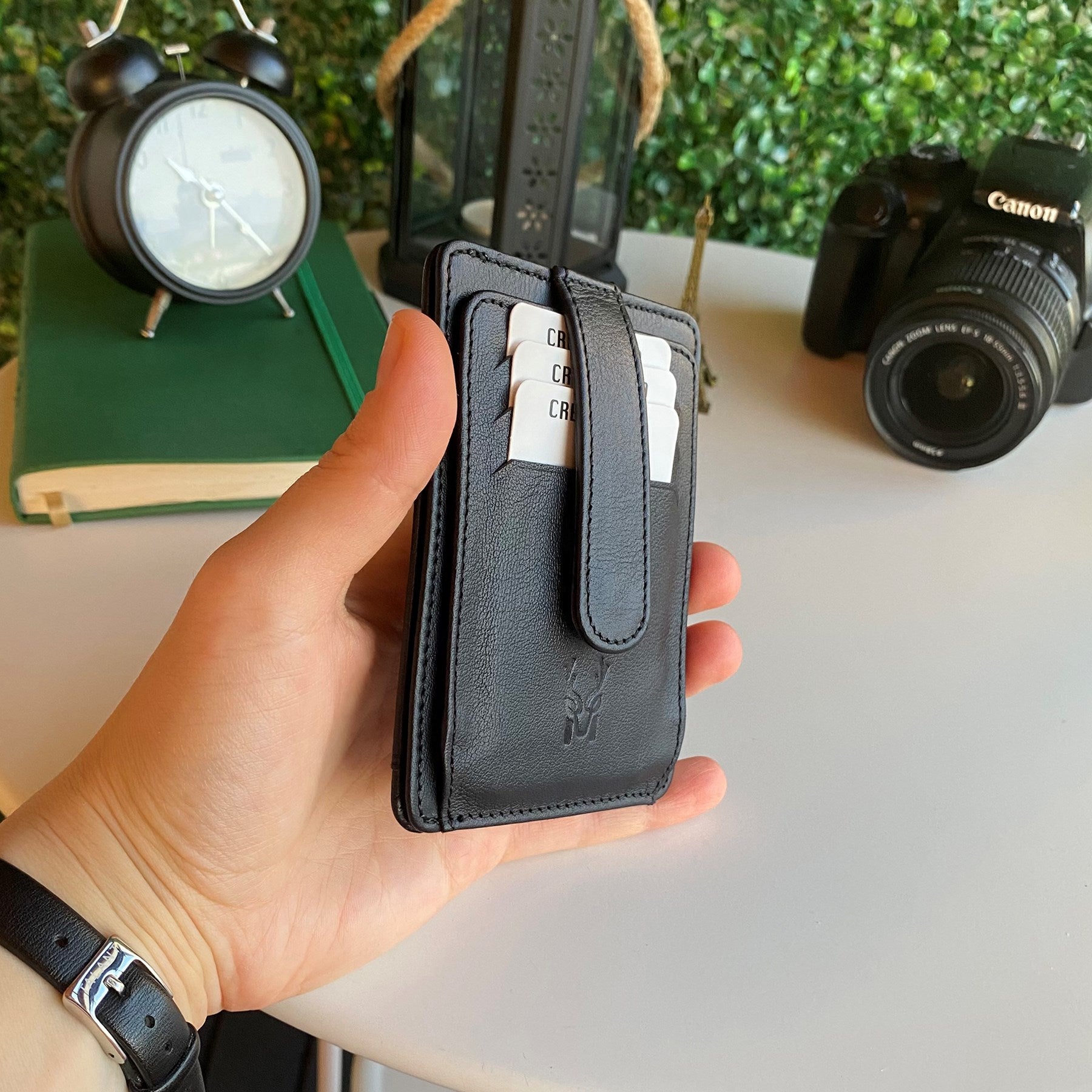 Zona Genuine Leather Card Holder showcasing its sleek design, ID window, and multiple card slots.