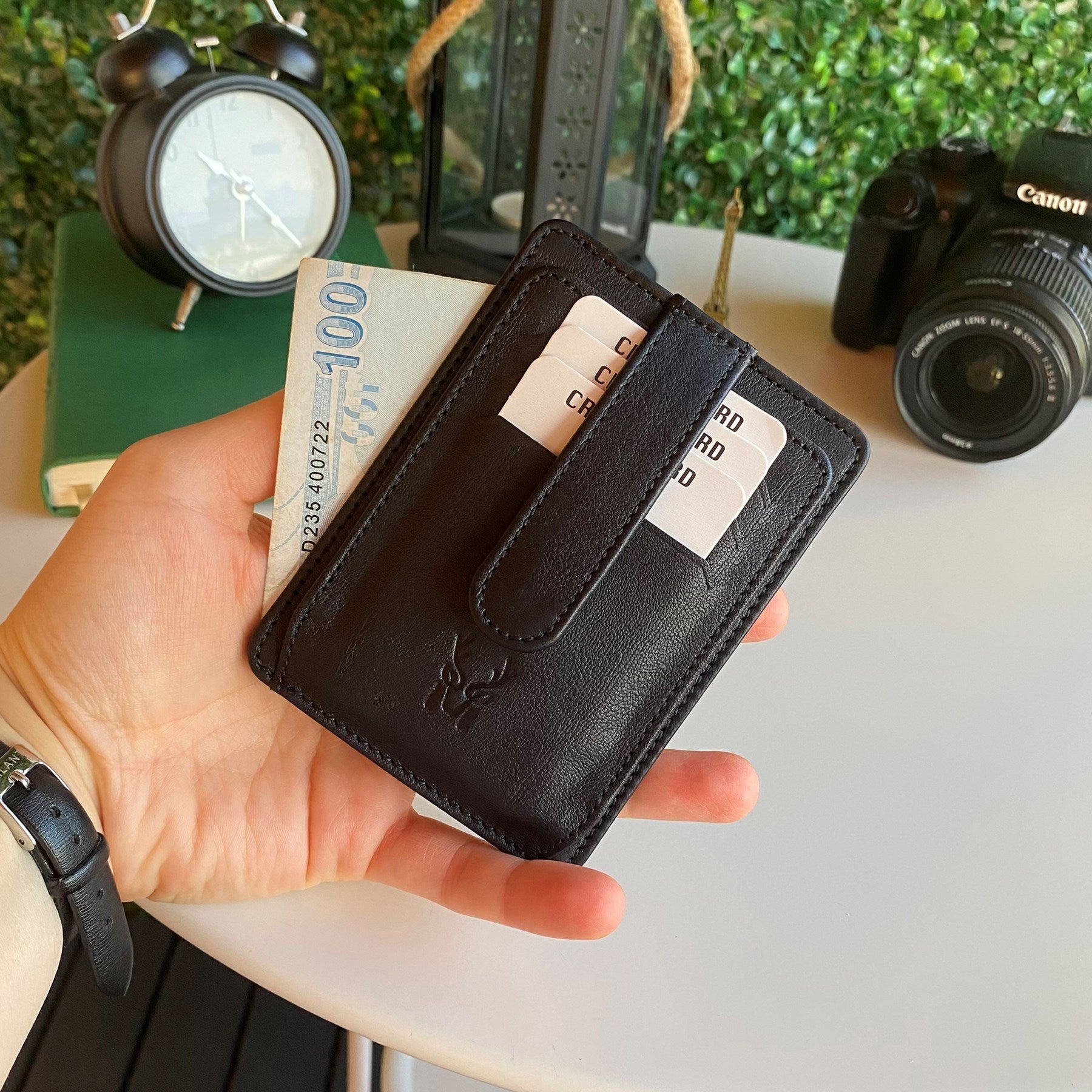 Zona Genuine Leather Card Holder showcasing its sleek design, ID window, and multiple card slots.