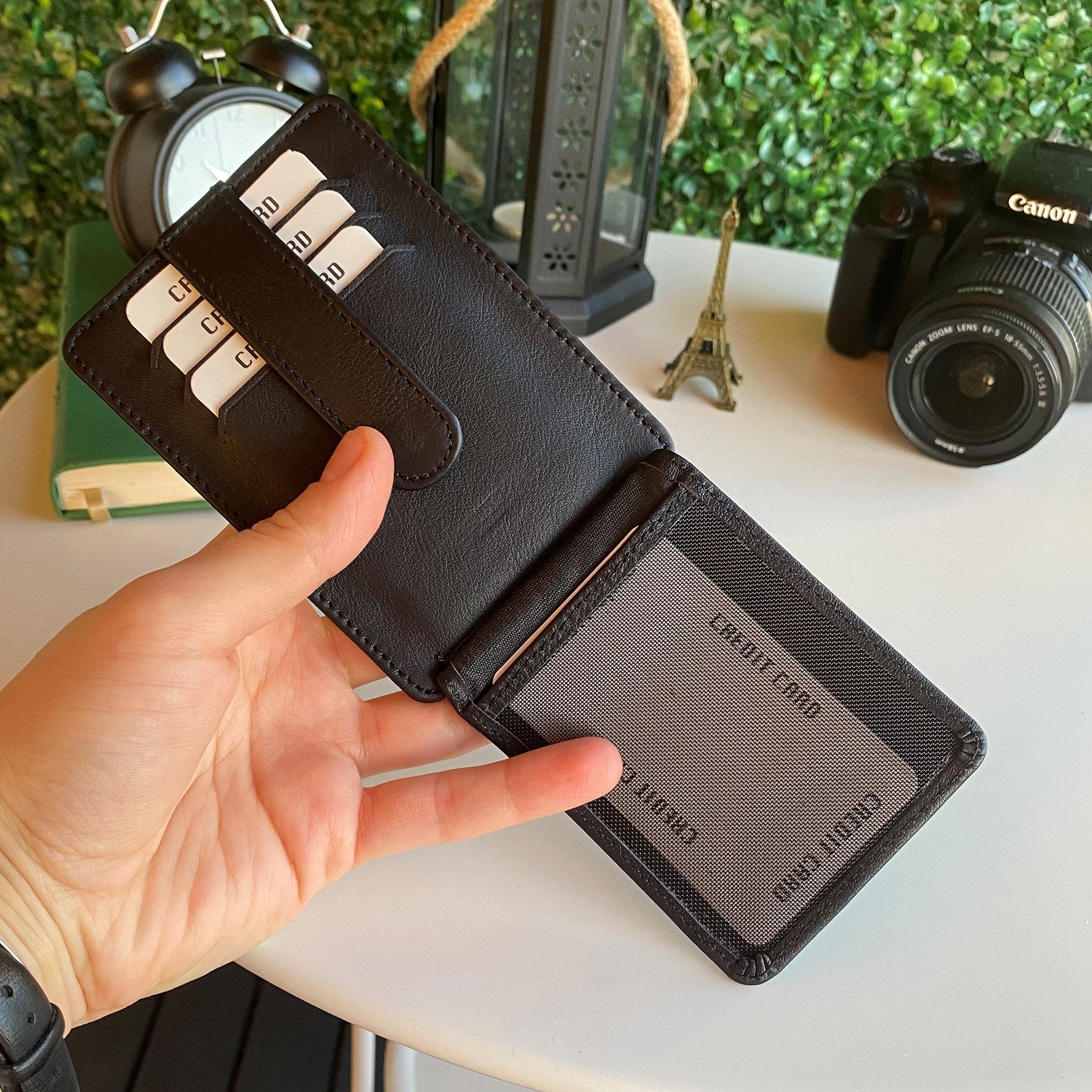 Zona Genuine Leather Card Holder showcasing its sleek design, ID window, and multiple card slots.