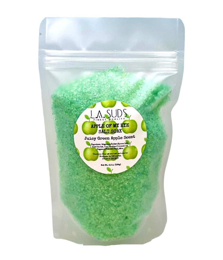 A vibrant package of Apple of My Eye Green Apple Salt Soak, showcasing its refreshing green apple scent and mineral-rich formula.