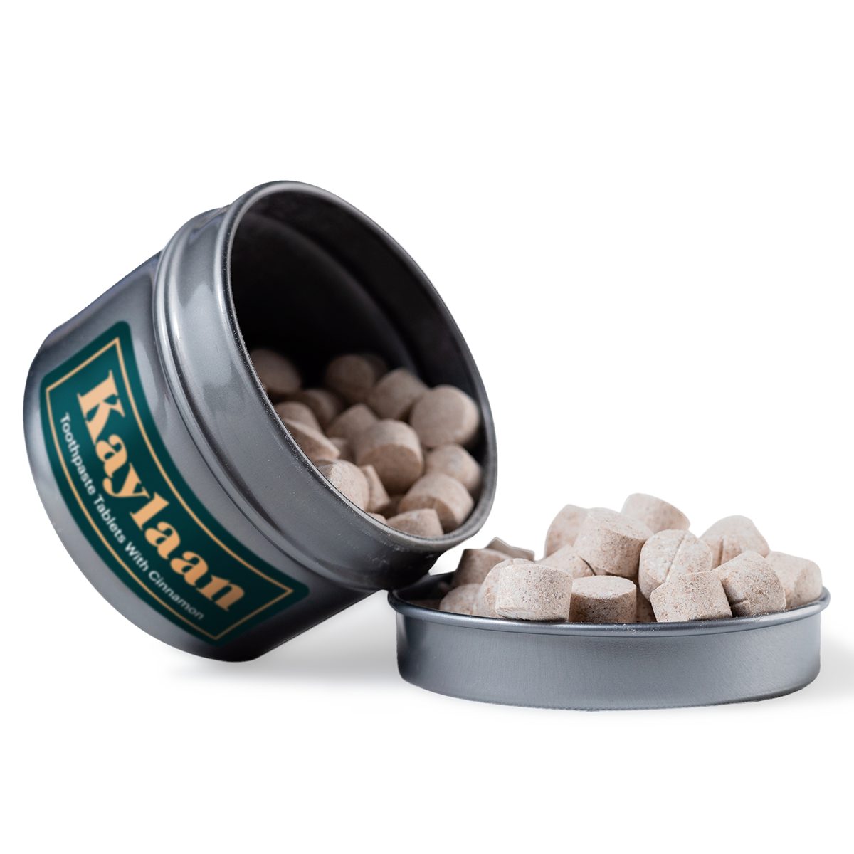 Cinnamon Toothpaste Tablets in a small eco-friendly package, showcasing their unique shape and color.