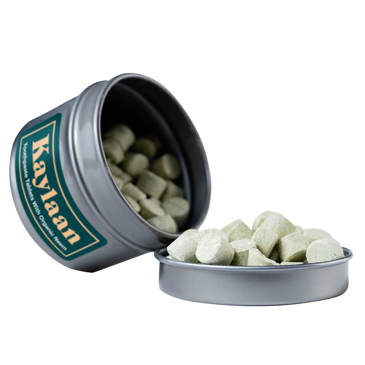 Cinnamon Toothpaste Tablets in a small eco-friendly package, showcasing their unique shape and color.