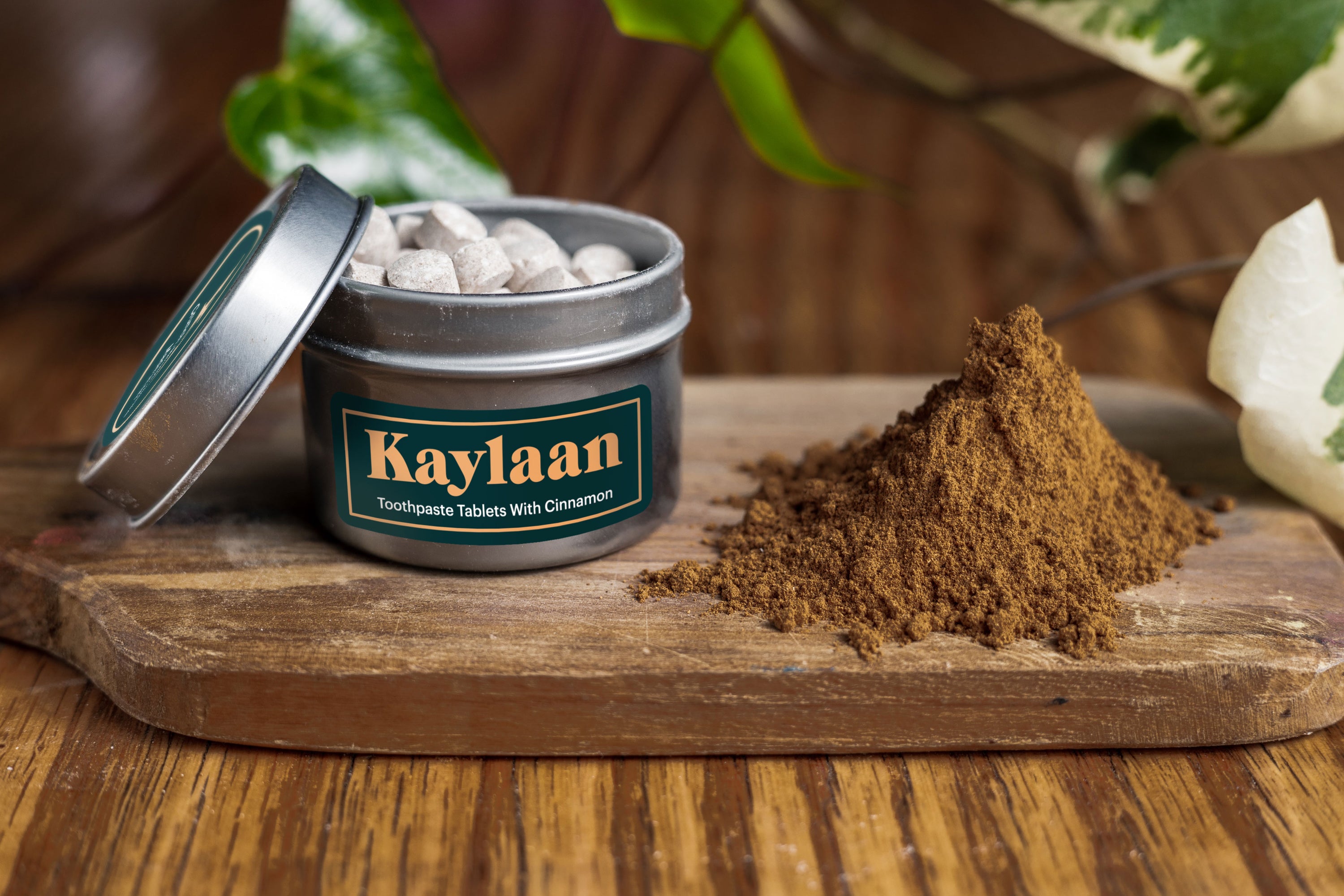 Cinnamon Toothpaste Tablets in a small eco-friendly package, showcasing their unique shape and color.