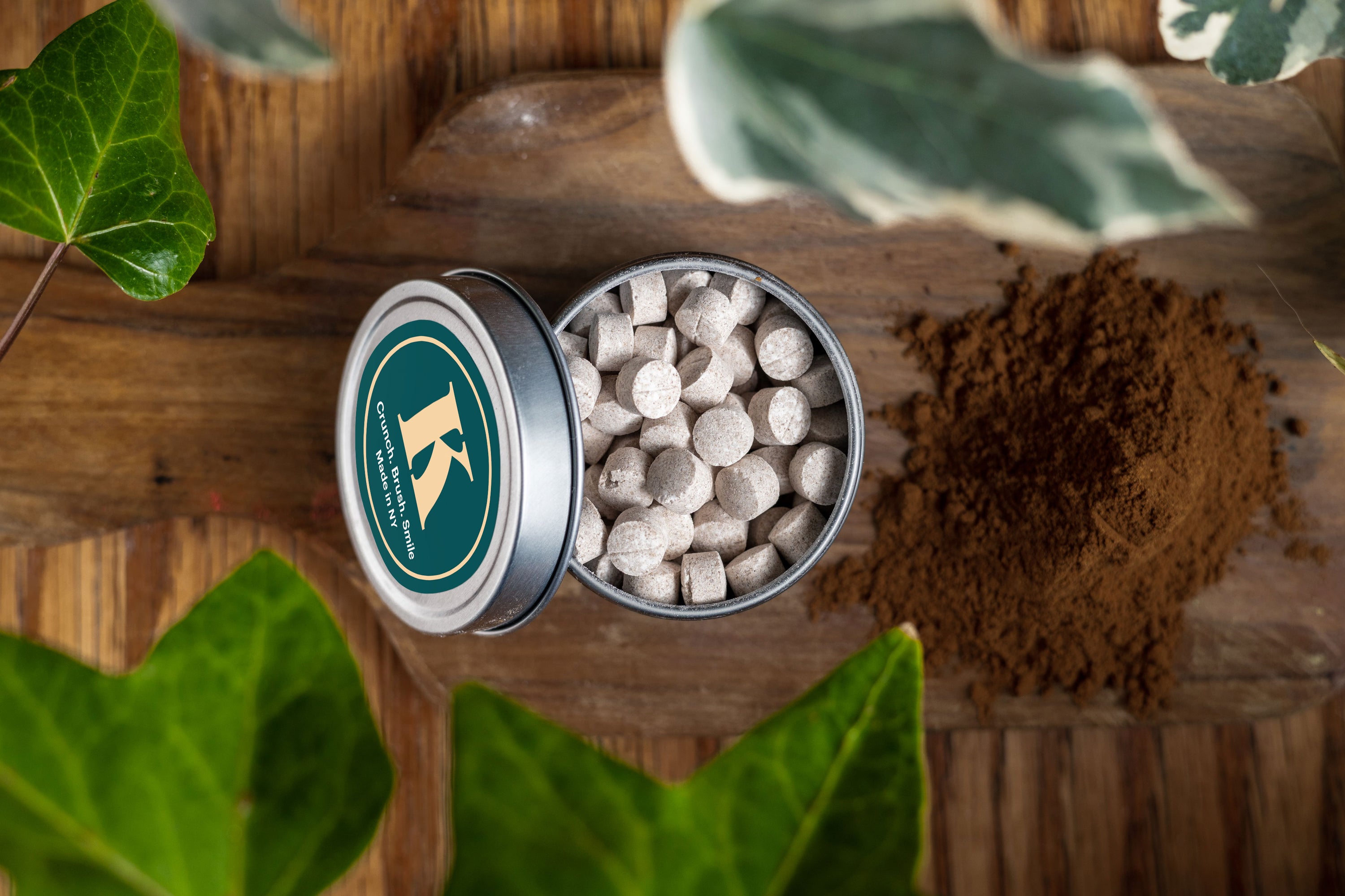 Cinnamon Toothpaste Tablets in a small eco-friendly package, showcasing their unique shape and color.