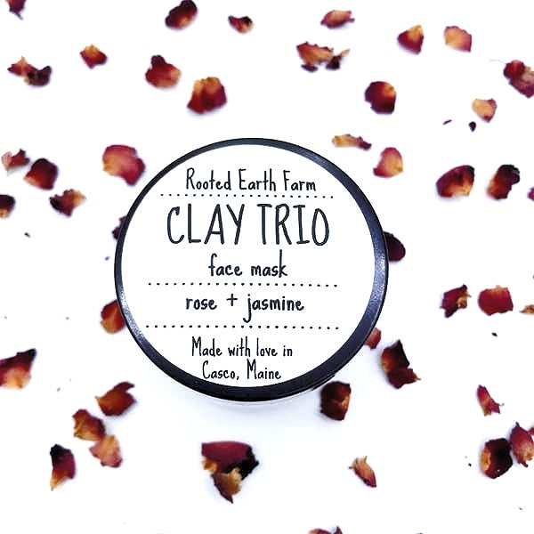 Clay Trio Ultra Detox Face Mask in a 2 oz glass jar with a floral design, showcasing its rich texture and natural ingredients.