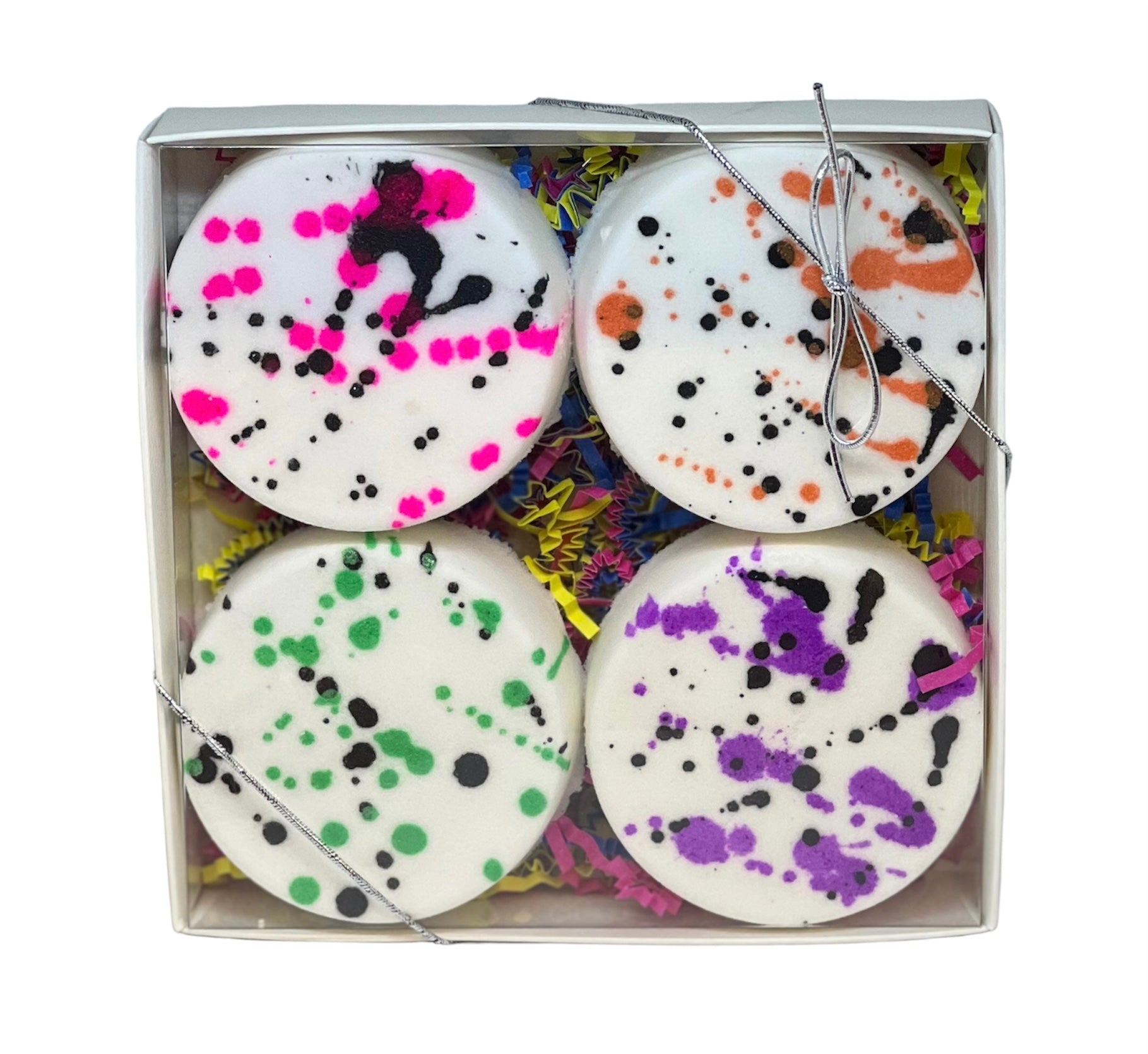 Electric Avenue Summer Bath Bomb Gift Set featuring four colorful bath bombs in a gift box with a stretchy bow.