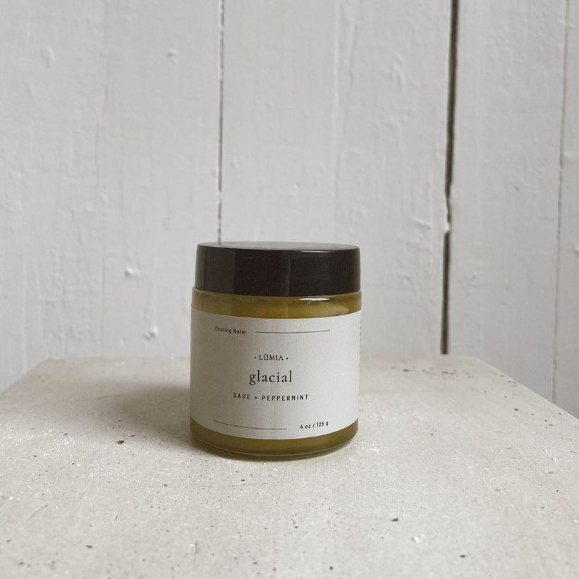Glacial Cooling Balm in a 4 fl oz container, featuring a blend of peppermint and eucalyptus for soothing muscle relief.