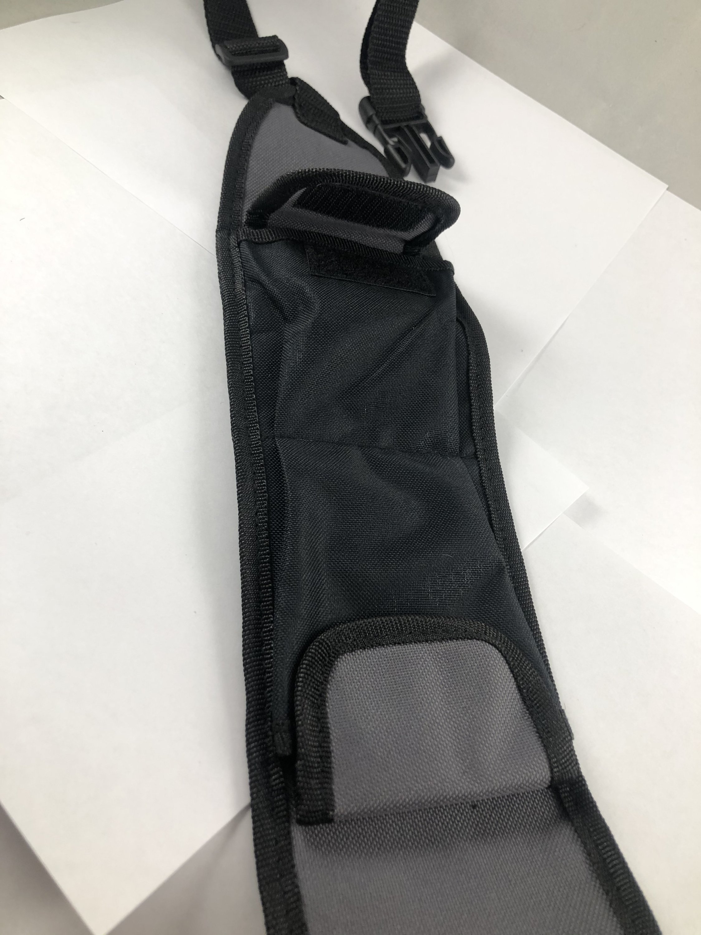 A custom-designed Hajj Belt featuring multiple pockets for convenience during pilgrimage.