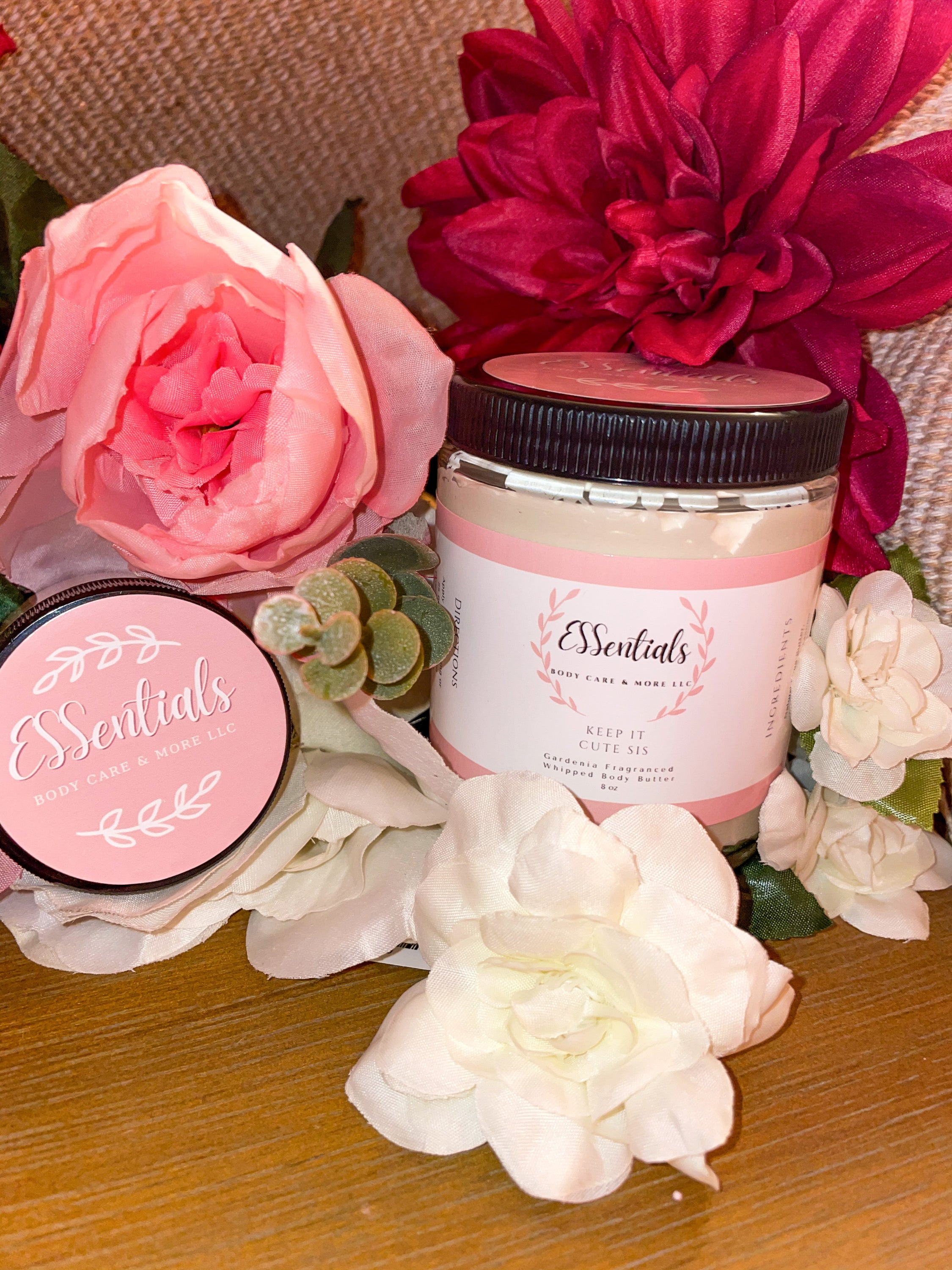 A jar of Keep It Cute Sis body butter with a floral gardenia design, showcasing its creamy texture and natural ingredients.