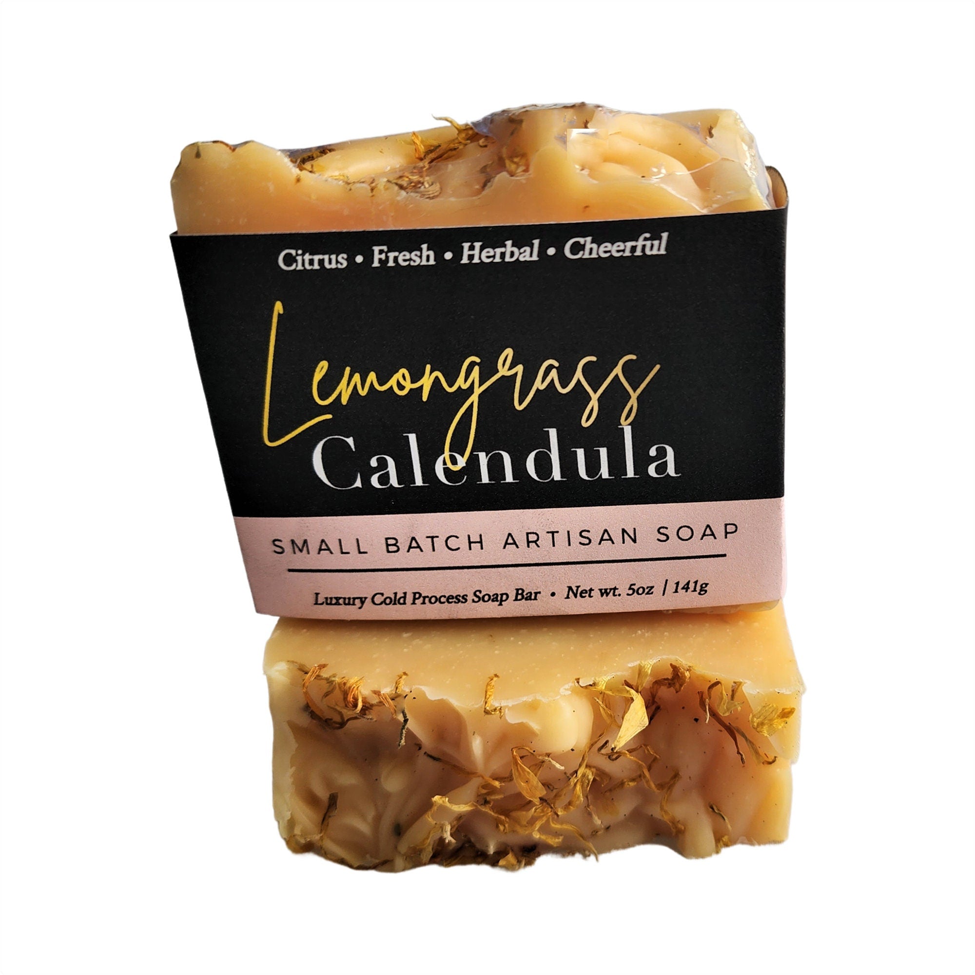 Lemongrass Calendula Soap bar topped with calendula petals, showcasing its vibrant colors and natural ingredients.